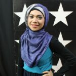 Indah Nevertari baju dan jilbab hijau