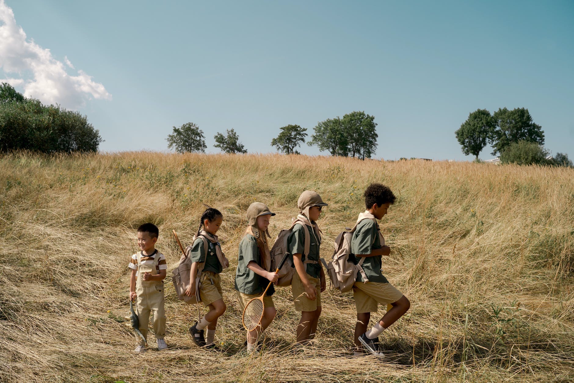 a group of kids scouting